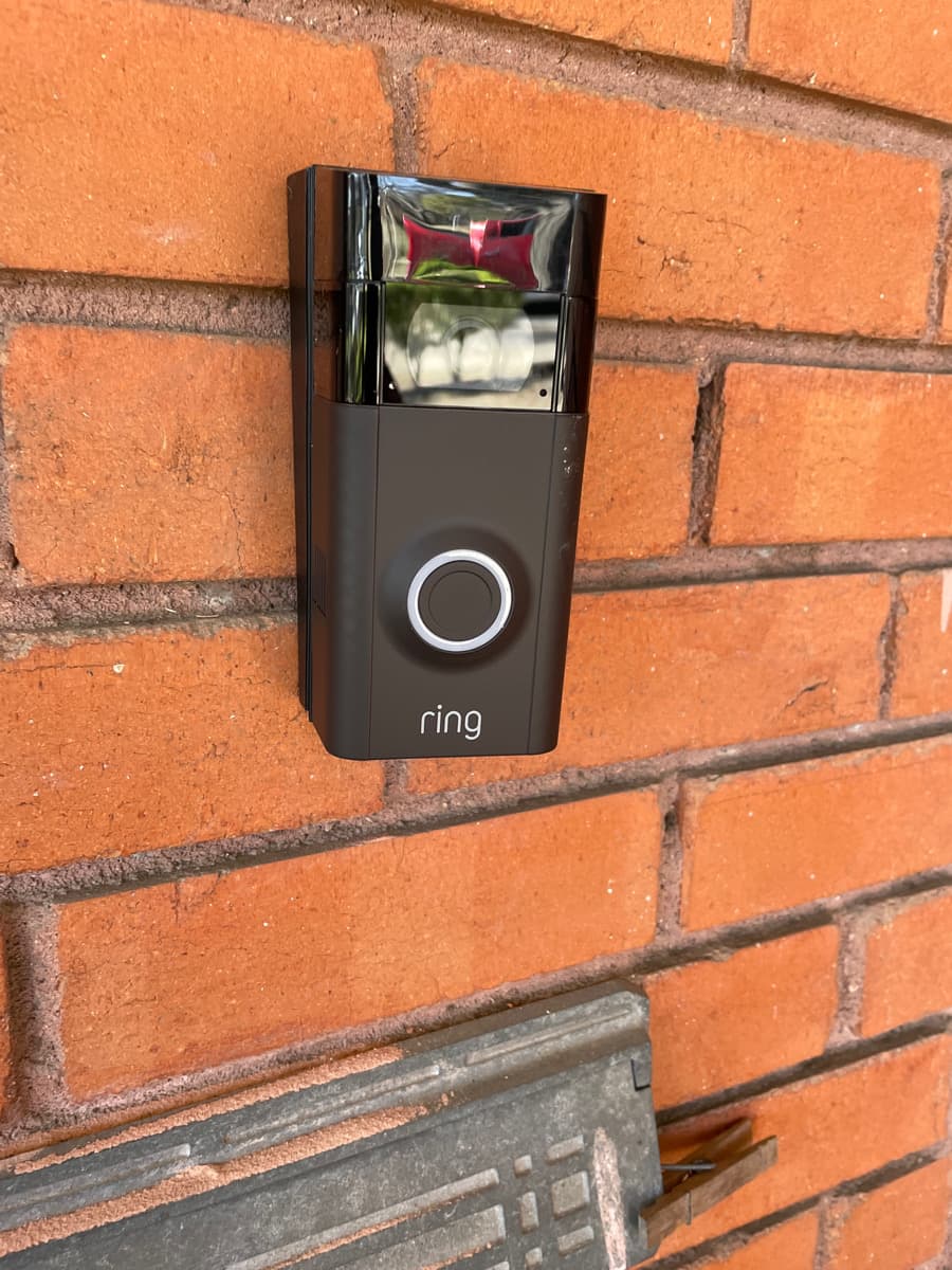 Ring Video Doorbell professionally installed on brick wall in Dallas–Fort Worth by Cognito Media Services